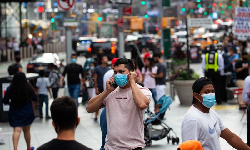 People walk in Times Square during the COVID-19 pandemic in New York, the United States, Sept. 13, 2020.Photo:Xinhua