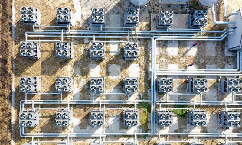 Aerial photo taken on Nov. 12, 2020 shows a heating station with clean energy at Wendeng district in Weihai, east China's Shandong Province. Shandong launched a campaign to promote a shift from coal to electricity for 358,400 households during its heating season in 2020, which will save 270,000 tonnes of standard coal and reduce emission of 680,000 tonnes of carbon dioxide in the heating season. (Xinhua/Zhu Zheng)