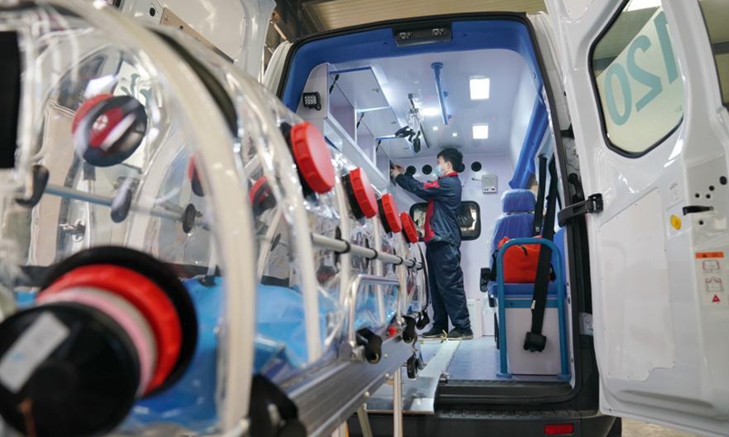 A worker adjusts equipment on an ambulance in Xingtai City, north China's Hebei Province, March 5, 2021. In recent years, Xingtai Economic Development Area has taken the development of equipment manufacturing industry as an important strategic measure to drive the industrial transformation and upgrading of the whole region. Photo: Xinhua