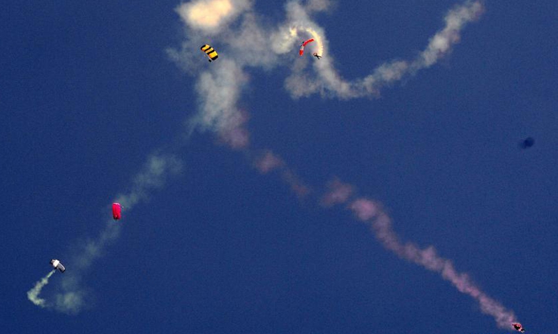 Photo taken on March 5, 2021 shows paragliders performing during the Islamabad Tourism Festival in Islamabad, capital of Pakistan. The three-day Islamabad Tourism Festival kicked off in Pakistan's capital on Friday. Photo: Xinhua