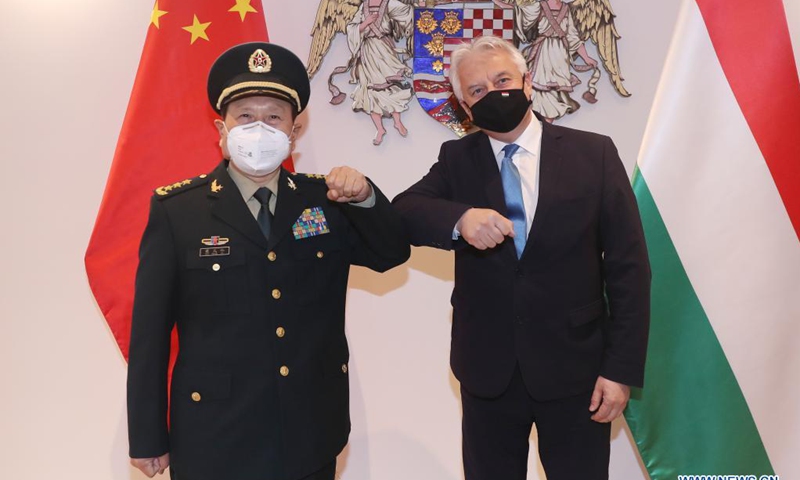 Hungarian Deputy Prime Minister Zsolt Semjen (R) meets with visiting Chinese State Councilor and Minister of National Defense Wei Fenghe in Budapest, Hungary, March 24, 2021.Photo:Xinhua