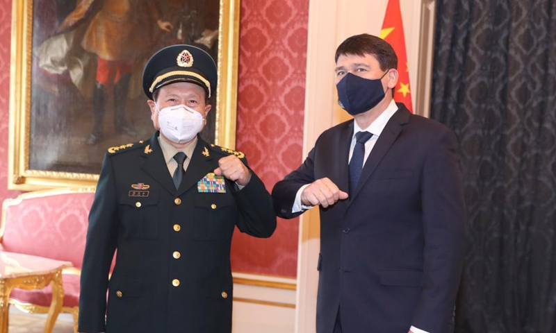 Hungarian President Janos Ader (R) meets with visiting Chinese State Councilor and Minister of National Defense Wei Fenghe in Budapest, Hungary, March 24, 2021.Photo:Xinhua