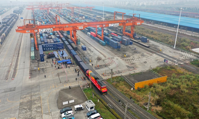 Aerial photo shows a China-Europe freight train bound for Duisburg of Germany departing from Tuanjiecun Railway Station in southwest China's Chongqing, Jan. 1, 2021.Photo:Xinhua