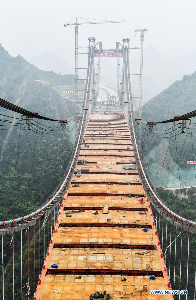 Photo taken on March 27, 2021 shows the construction site of the Yangbaoshan grand bridge in Guiding County, southwest China's Guizhou Province. With a main span of 650 meters, the grand bridge, which is a part of the Guiyang-Huangping Highway, stretches 1,112 meters in length.  Photo: Xinhua