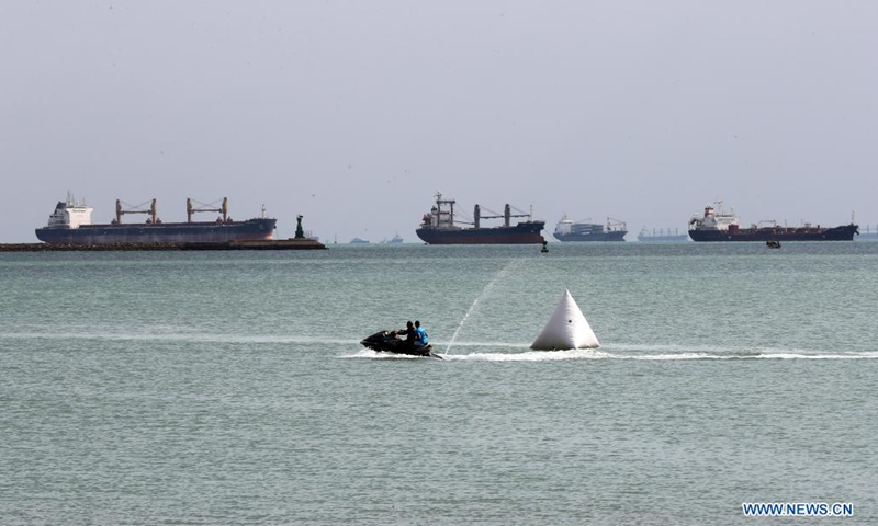 Ships wait to pass the Suez Canal in the Gulf of Suez, Egypt, on March 26, 2021. Egypt's Suez Canal Authority (SCA) said on Thursday that it has temporarily suspended navigation through the world's busiest shipping course until the grounded cargo ship is completely freed.Photo:Xinhua