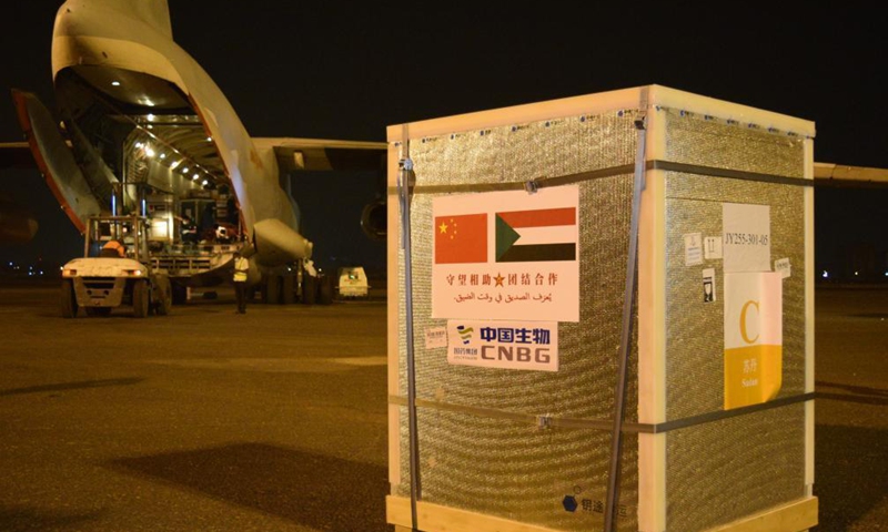 Chinese vaccines are unloaded from a plane at the Khartoum International Airport in Khartoum, Sudan, March 26, 2021. A batch of China's Sinopharm COVID-19 vaccines, donated by the Chinese government to Sudan, arrived here on Friday.Photo:Xinhua