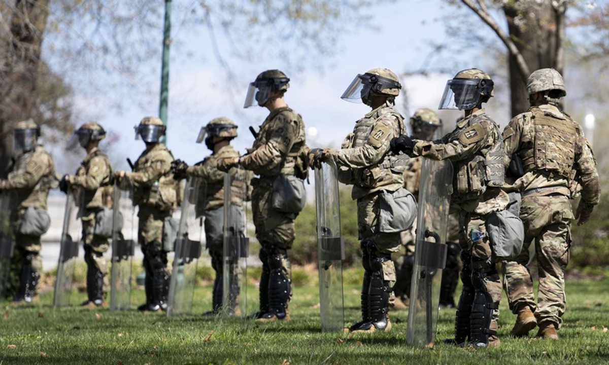 US National Guard members stand guard in front of the US Capitol building in Washington, D.C., the United States, on April 2, 2021. (Xinhua/Liu Jie)