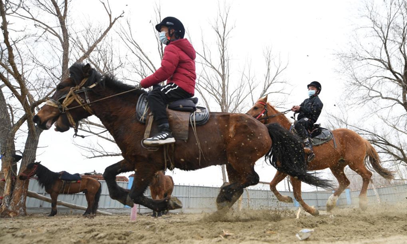 Students from Oymak Boarding School practise riding during an equestrian class in Burqin County, northwest China's Xinjiang Uygur Autonomous Region, March 29, 2021. Photo: Xinhua