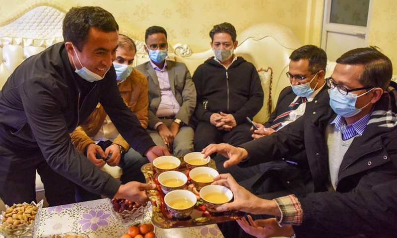 Foreign diplomats visit a resident in Nazarbagh Town of Kashgar, northwest China's Xinjiang Uygur Autonomous Region, March 31, 2021. From March 30 to April 2, a delegation comprising Vladimir Norov, secretary-general of the Shanghai Cooperation Organization (SCO), and more than 30 diplomats from some 21 countries visited Xinjiang.Photo:Xinhua