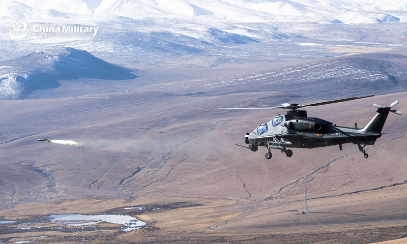 An armed helicopter assigned to an army aviation brigade under the PLA Tibet Military Command carries out live-fire training on March 25, 2021, aiming to improve the air combat capability.Photo:China Military