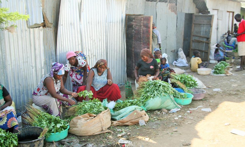 Undated file photo shows women selling vegetables at the Kakuma refugee camp in Turkana County, Kenya. Kenya said on March 24 it has issued a two-week ultimatum to the UN refugee agency to devise a roadmap on the definite closure of Dadaab and Kakuma refugee camps in the northern region.Photo:Xinhua