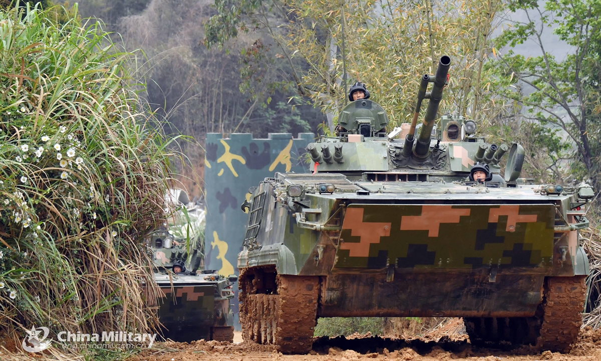 Armored vehicles attached to a combined arms brigade under the PLA 73rd Group Army carry out round-the-clock shooting assessment with multiple ammunitions, in a bid to test the troops’ combat capability on April 1, 2021.Photo:China Military