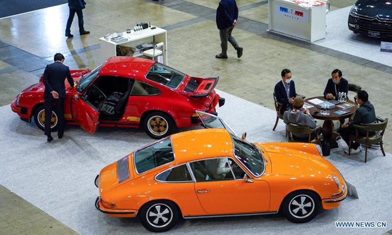 Visitors attend the Automobile Council 2021 car show at Makuhari Messe convention center in Chiba, Japan on April 9, 2021. The show, displaying a wide range of classic vehicles, aims to promote automobile culture and lifestyle in Japan.Photo:Xinhua