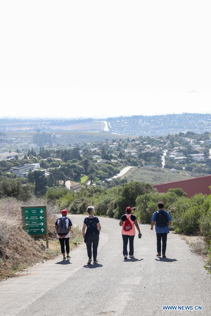 Visitors walk at Tygerberg Nature Reserve in Cape Town, legislative capital of South Africa, April 10, 2021. (Xinhua/Lyu Tianran)