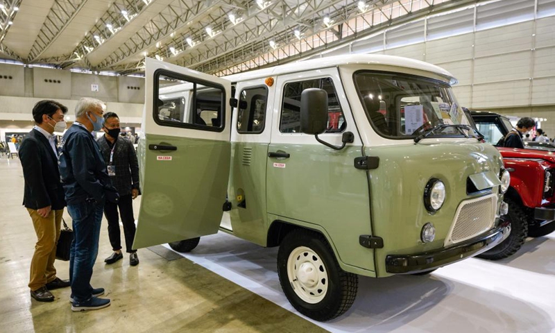 People look at the interior of a UAZ 2206 Jubilee on display during the Automobile Council 2021 car show at Makuhari Messe convention center in Chiba, Japan on April 9, 2021. The show, displaying a wide range of classic vehicles, aims to promote automobile culture and lifestyle in Japan.Photo:Xinhua