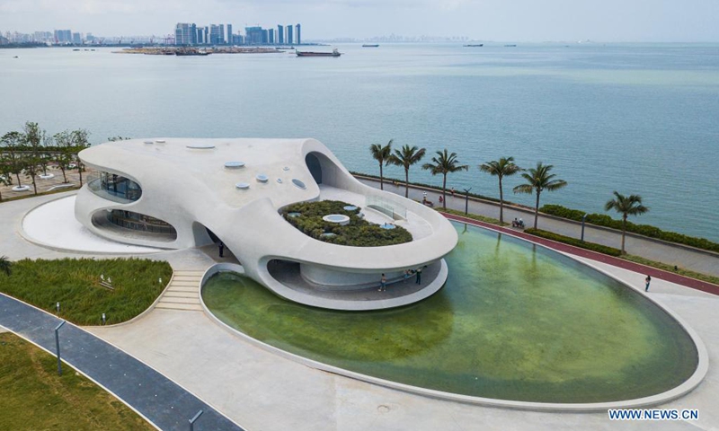 Aerial photo taken on April 13, 2021 shows the Wormhole Library in the Haikou Bay in Haikou, capital city of south China's Hainan Province. The Wormhole Library, designed as a landmark building in the Haikou Bay, opened to public on Tuesday.  (Photo: Xinhua)