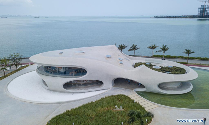 Aerial photo taken on April 13, 2021 shows the Wormhole Library in the Haikou Bay in Haikou, capital city of south China's Hainan Province. The Wormhole Library, designed as a landmark building in the Haikou Bay, opened to public on Tuesday.  (Photo: Xinhua)