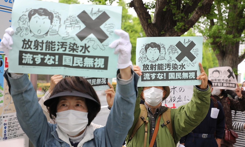 People rally to protest against the Japanese government's decision to discharge contaminated radioactive wastewater in Fukushima Prefecture into the sea, in Tokyo, capital of Japan, April 13, 2021.(Photo: Xinhua)