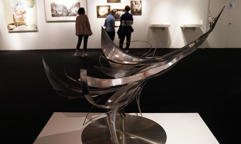 Visitors view exhibits at an auction preview in the Hong Kong Convention and Exhibition Centre in south China's Hong Kong on April 16, 2021. Sotheby's Hong Kong Spring Sales Series kicked off on Friday and will last till April 23.Photo:Xinhua