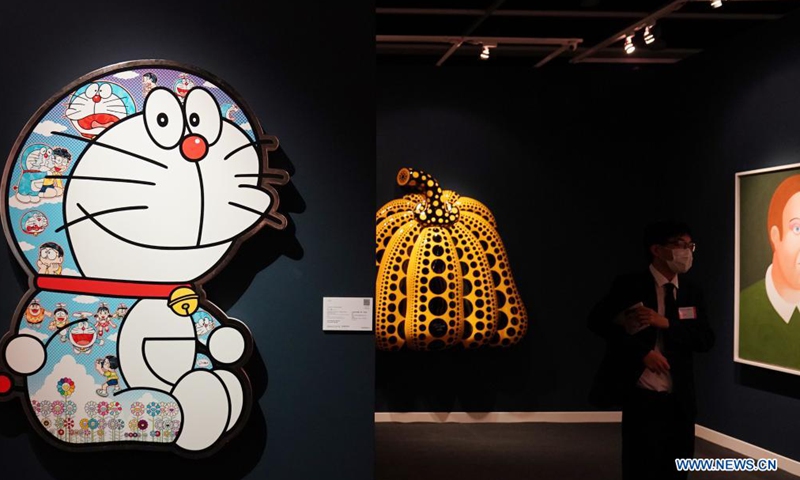 A staff member is seen at an auction preview in the Hong Kong Convention and Exhibition Centre in south China's Hong Kong on April 16, 2021. Sotheby's Hong Kong Spring Sales Series kicked off on Friday and will last till April 23.Photo:Xinhua