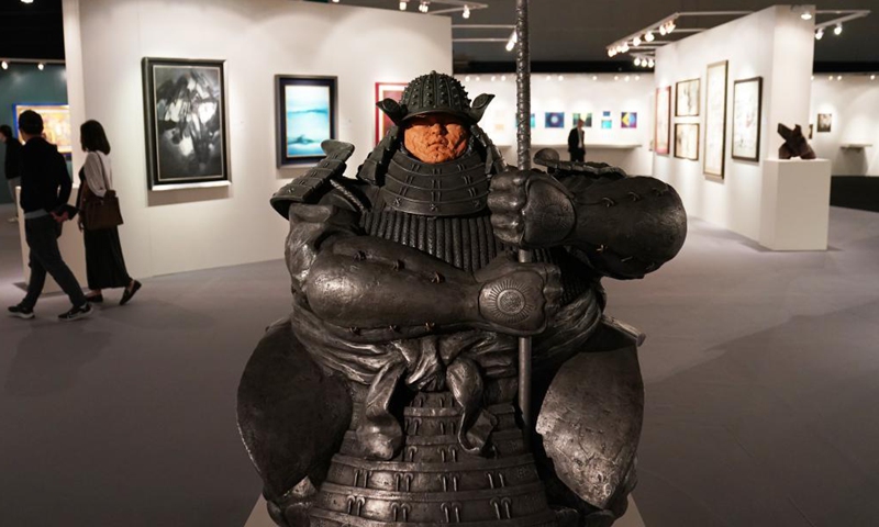 Visitors view exhibits at an auction preview in the Hong Kong Convention and Exhibition Centre in south China's Hong Kong on April 16, 2021. Sotheby's Hong Kong Spring Sales Series kicked off on Friday and will last till April 23.Photo:Xinhua