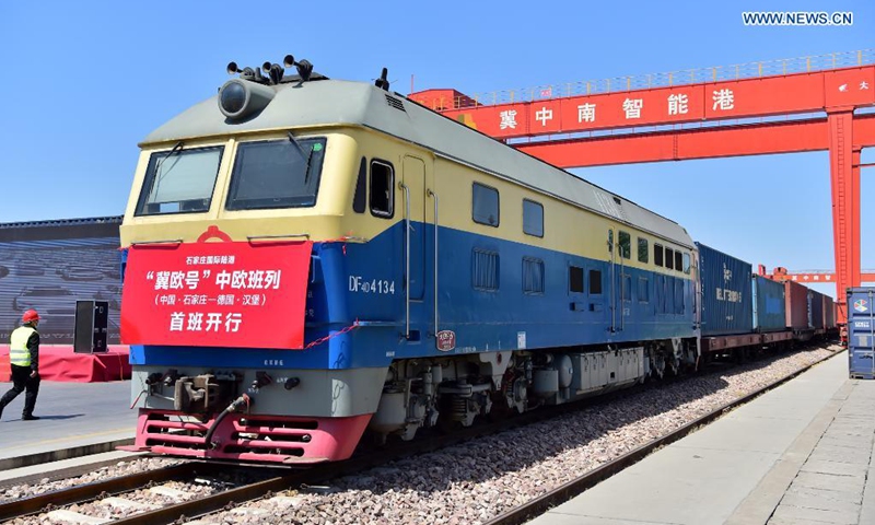 A freight train bound for Hamburg, Germany is ready to depart at the Shijiazhuang international land port in north China's Hebei Province, on April 17, 2021. The first China-Europe freight train bound for Germany from Hebei Province set out on Saturday in Shijiazhuang. The train, loaded with 100 twenty-foot equivalent unit (TEU) of cargo, is expected to arrive in Hamburg in 18 days.(Photo: Xinhua)