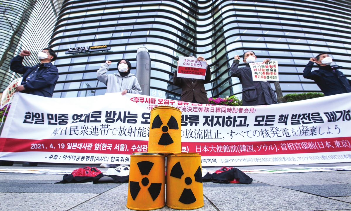 Members of a civic group stage a rally to denounce the Japanese government’s decision on Fukushima water, in front of a building which houses the Japanese embassy in Seoul, South Korea, on Monday. The Japanese government announced on April 13 that it would start releasing treated radioactive water from the wrecked Fukushima nuclear plant into the Pacific Ocean in two years. Photo: VCG