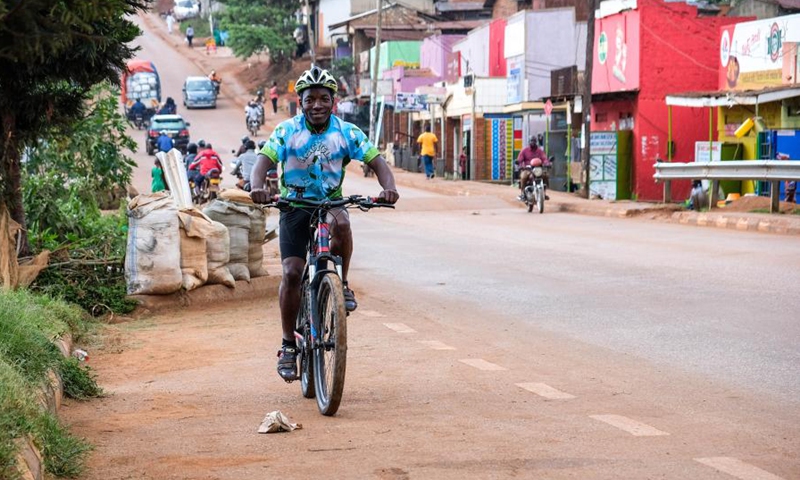 Gerald Ndashimye, the founder of Eco Ways Uganda, rides his sport bicycle in Kampala, Uganda, April 16, 2021.(Photo: Xinhua)