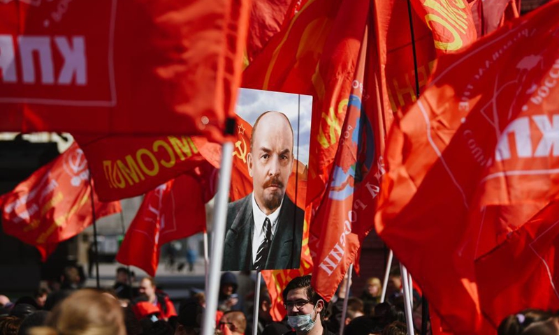 Photo taken on April 22, 2021 shows a portrait of Vladimir Lenin during a flower laying ceremony at Lenin's mausoleum to mark the 151st anniversary of the revolutionary leader's birth in Moscow, Russia.Photo:Xinhua