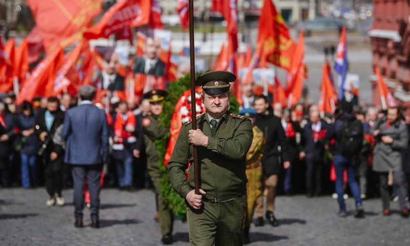 Supporters of the Communist party of Russia (KPRF) attend a flower laying ceremony at Vladimir Lenin's mausoleum to mark the 151st anniversary of the revolutionary leader's birth in Moscow, Russia, on April 22, 2021. Photo:Xinhua