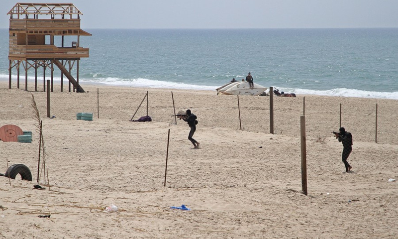 Palestinian militants of the Al-Mujahideen Brigades hold an anti-Israel military drill in Gaza City, on April 24, 2021.(Photo: Xinhua)