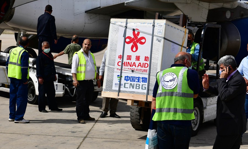 Chinese COVID-19 vaccines are unloaded from a plane at the international airport in Damascus, Syria, April 24, 2021.(Photo: Xinhua)