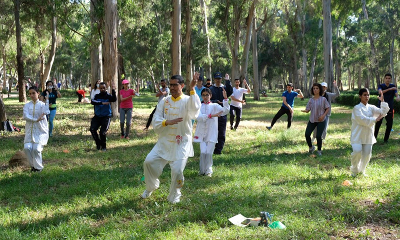 A group of Wushu enthusiasts practice Taiji in Rabat, Morocco, on April 18, 2021.(Photo: Xinhua)