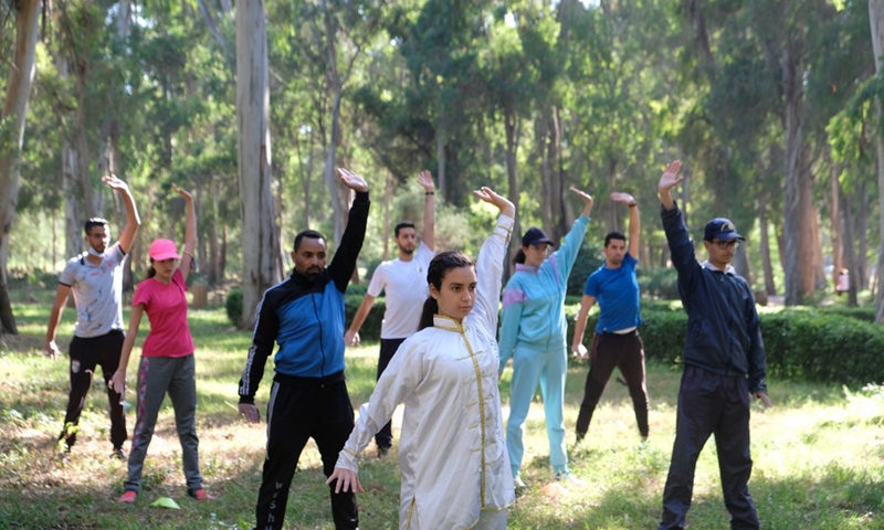 A group of Wushu enthusiasts practice Taiji in Rabat, Morocco, on April 18, 2021.(Photo: Xinhua)
