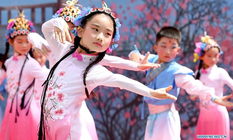 Students perform opera calisthenics in Dongyangshi primary school in Beilin District of Xi'an City, capital of northwest China's Shaanxi Province, April 29, 2021.Photo:Xinhua