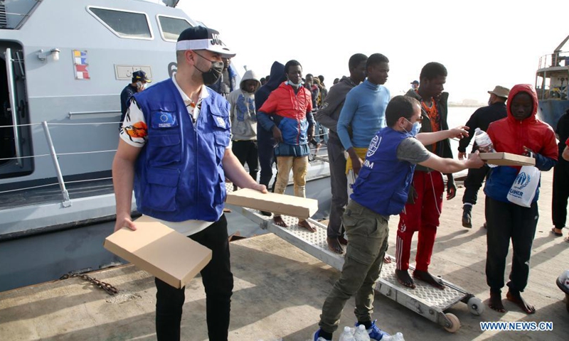 Illegal immigrants arrive at a naval base in Tripoli, Libya, on April 29, 2021. The Libyan Coast Guard on Thursday rescued 99 illegal immigrants off the western coast of the town Mellitah, some 70 km west of the capital Tripoli, as their boat was about to sink. Photo:Xinhua