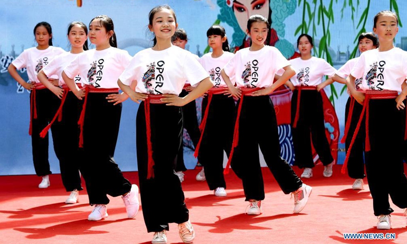 Students perform opera calisthenics in Dongyangshi primary school in Beilin District of Xi'an City, capital of northwest China's Shaanxi Province, April 29, 2021.Photo:Xinhua