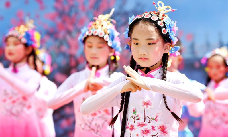 Students perform opera calisthenics in Dongyangshi primary school in Beilin District of Xi'an City, capital of northwest China's Shaanxi Province, April 29, 2021.Photo:Xinhua