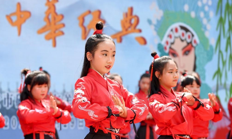 Students perform opera calisthenics in Dongyangshi primary school in Beilin District of Xi'an City, capital of northwest China's Shaanxi Province, April 29, 2021.Photo:Xinhua