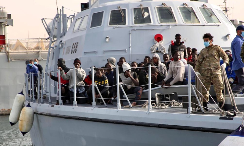 Illegal immigrants are seen on the deck of a Libyan Coast Guard's ship in Tripoli, Libya, on April 29, 2021.Photo:Xinhua
