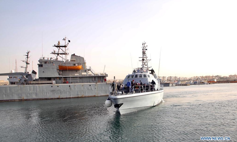 Illegal immigrants are seen on the deck of a Libyan Coast Guard's ship in Tripoli, Libya, on April 29, 2021. Photo:Xinhua