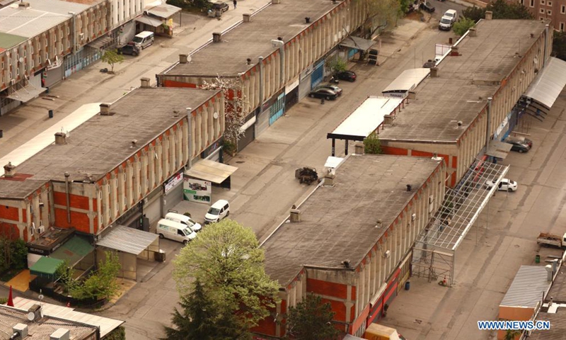 Shops selling auto parts are seen closed during the lockdown in Istanbul, Turkey, May 3, 2021. Turkey is currently under full lockdown that began on Thursday and will last until May 17, in an attempt to reduce the growing COVID-19 cases ahead of the tourism season. (Xinhua/Xu Suhui)