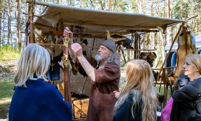 People visit a spring market in Riga, Latvia, on May 1, 2021. Photo: Xinhua