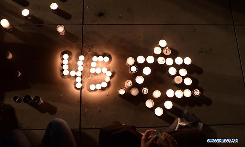 Candles are lit for the 45 victims killed in a stampede which took place during a festival celebrated on the eve of the Jewish holiday Lag BaOmer, at Habima Square in Tel Aviv, Israel, on May 1, 2021. Israeli Prime Minister Benjamin Netanyahu declared Sunday as a national day of mourning following the disaster on Thursday night. (Tomer Neuberg/JINI via Xinhua)