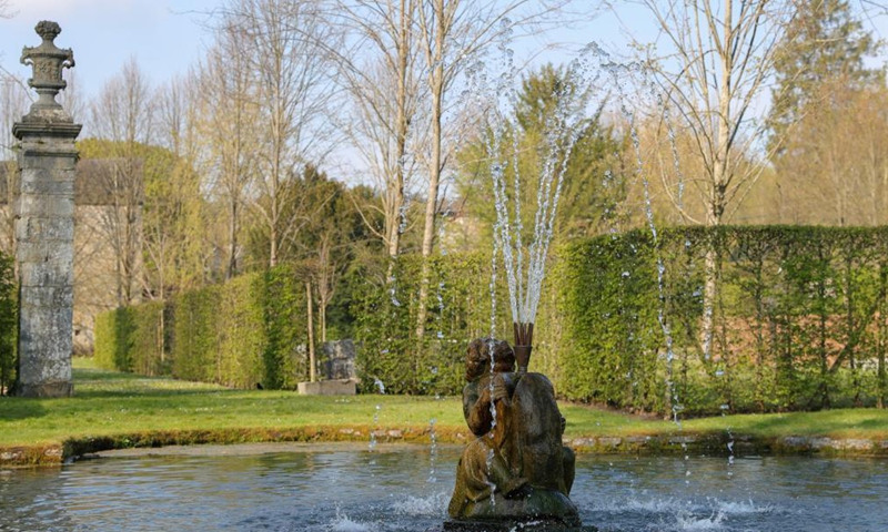 A pond and a fountain are seen in the Water Gardens of Annevoie in Annevoie-Rouillon, Namur, Belgium, May 1, 2021. Photo: Xinhua