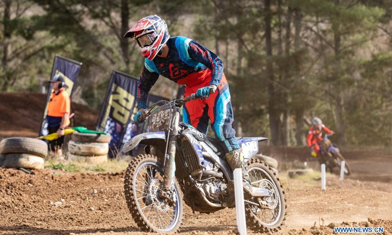 Riders compete during the second round of the 2021 Australian Motocross Championship in Canberra, Australia, May 2, 2021 (Photo by Chu Chen/Xinhua)