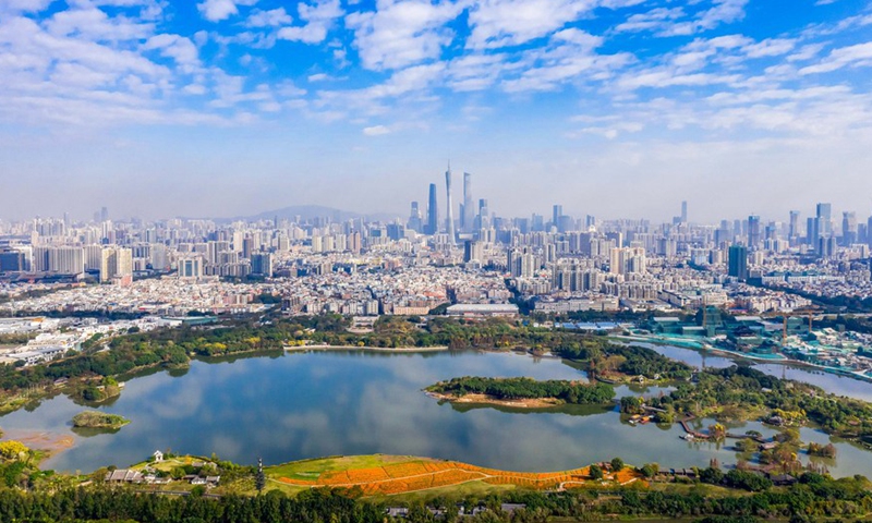 Aerial photo taken on Feb. 24, 2020 shows the Haizhu wetland and the Canton Tower in the distance in Guangzhou, south China's Guangdong Province. (Photo by Xie Huiqiang/Xinhua)
