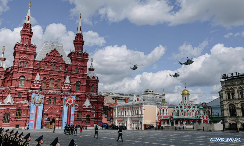 Helicopters fly over the Red Square during a rehearsal of the Victory Day parade in Moscow, Russia, May 7, 2021. Russia will hold military parades across the country to commemorate the 76th anniversary of the Soviet victory in the Great Patriotic War on May 9. Photo:Xinhua