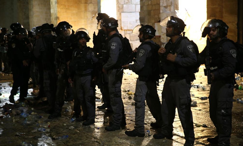 Israeli police are seen during clashes at the Al-Aqsa Mosque compound in East Jerusalem on May 7, 2021. Hundreds of people were injured Friday when Palestinians and Israeli police clashed at Jerusalem's Al-Aqsa Mosque in the old city in East Jerusalem, local media reported. Photo:Xinhua
