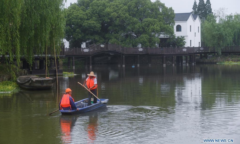 Aerial photo taken on May 8, 2021 shows leakproof workshops and conveyors at a construction material company in Donglin Township, Wuxing District of Huzhou City, east China's Zhejiang Province. Donglin Township has engaged all local residents in protecting the ecological environment by reducing pollutants such as floating dusts from the source.Photo:Xinhua